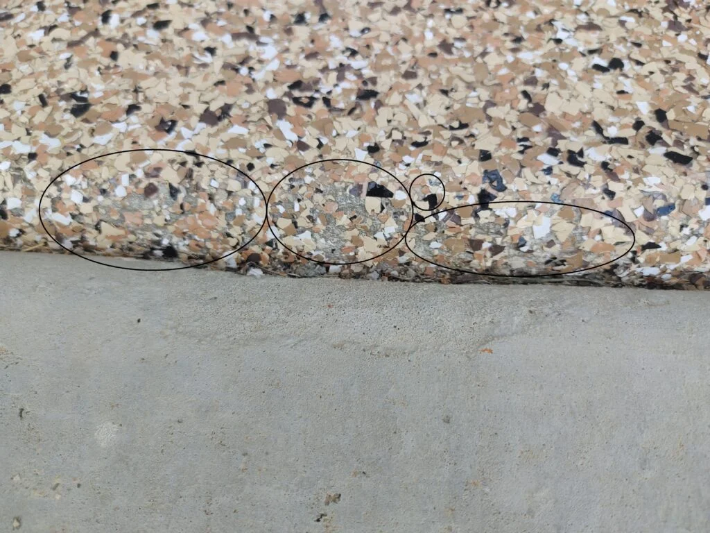 One Day garage epoxy floor install bald spot.