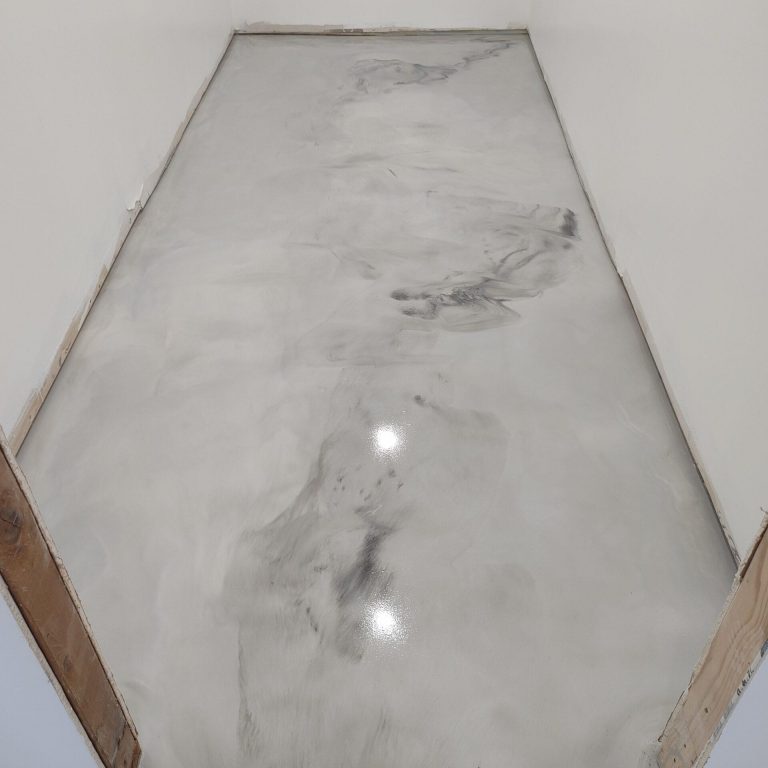 Rossi Decorative Concrete & Epoxy Basement Metallic Epoxy Floor